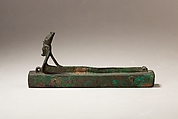 Atum as a human-headed cobra surmounting a box for an animal mummy, Cupreous metal