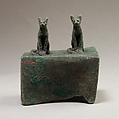 Two cats surmounting a box for an animal mummy, Cupreous metal