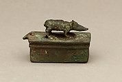 Shrew-mouse surmounting shrine-shaped box for an animal mummy, Cupreous metal