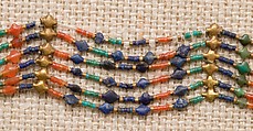 Acacia Bead Girdle of Senebtisi, Gold, carnelian, turquoise, lapis-lazuli, also possibly ivory (restored), crystal