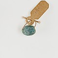 Seal in the form of a hedgehog, Light green faience
