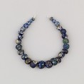 String of 27 Eyed Beads, Glass