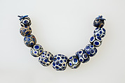 String of 12 Eye Beads, Glass