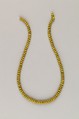 String of 115 discoid ridged beads, Yellow glass