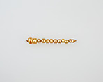 String of 12 elongated disc beads, glass, gold foil