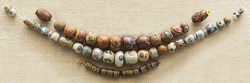 String of 25 Eyed Beads, Glass