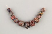 String of 11 beads, Mosaic glass