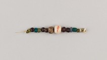 String of 16 beads, Glass