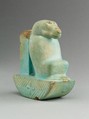 Figure of baboon on a basket and with a pillar, the shebet offering, Faience, pale blue glaze