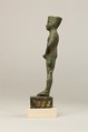 Statuette of Amenopet naming the provider/beneficiary  Amenirdis son of Horiaa, Cuperous metal, precious metal inlay