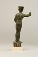 Statuette of Amenopet naming the provider/beneficiary  Amenirdis son of Horiaa, Cuperous metal, precious metal inlay
