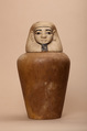 Canopic jar of Nephthys, Indurated limestone, paint, linen