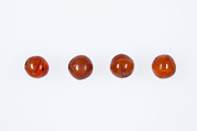 Round beads from the mummy of Ukhhotep, Carnelian