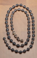 Necklace of Hapiankhtifi, Black obsidian ball beads; silver caps<br/>Silver