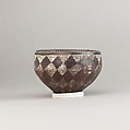 Drinking Cup, Black incised ware with white filling.