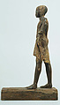 Statuette of a Young Man, Wood (probably ebony), gesso, linen, glass inlay