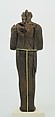Shabti of Amenhotep III, Ebony; eyes inlaid with blue, white, black glass;  inscription filled with pigment