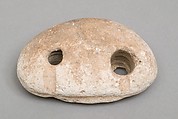 Weighing down device (fish net sinker?), Limestone