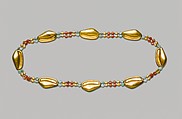 Cowrie Shell Girdle of Sithathoryunet, Gold, carnelian, feldspar, pellets of copper-silver alloy
