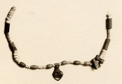 Necklace of beads and amulets, Faience, paste<br/>Shell (Marine), Nacre, Pearl<br/>Wood<br/>Gold