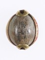 Cowroid Bead Set in a Ring Bezel, Steatite (glazed), gold