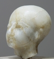 Head with cap and beardstraps, perhaps Ptah, Quartz