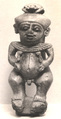 Amulet of Ptaikos on the crocodiles, Faience