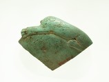 Fragment of a dish with a lion reclining on the rim, Faience