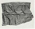 Chalice rim fragment with floral chain and scene of man in papyrus, Faience