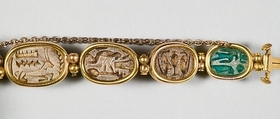 Nine scarabs set in modern bracelet., Glazed steatite, gold
