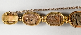 Nine scarabs set in modern bracelet., Glazed steatite, gold