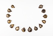 Fourteen pendants for a necklace, Silver and shell