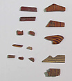 Inlays from shrine: box of striped bars, Glass