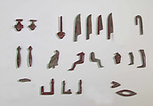 Inlays from shrine: hieroglyphs, Glass