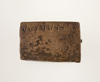Part of a bronze statue base inscribed in Egyptian and Greek, Copper alloy