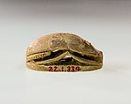 Scarab Decorated with Symbol of Unification, Faience, traces of green glaze