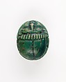 Human-face Scarab with Sphinx and Hieroglyphs, Dark green glazed steatite