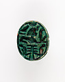 Human-face Scarab with Sphinx and Hieroglyphs, Dark green glazed steatite