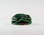 Human-face Scarab with Sphinx and Hieroglyphs, Dark green glazed steatite