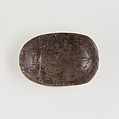 Scarab, uninscribed, Greyish-brown stone