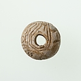 Bead with the name of Amenemhat II, Unglazed faience