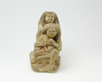 Group of two women and a child, Limestone, paint