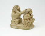 Group of two women and a child, Limestone, paint