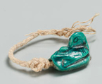 Duck Design-amulet, Glazed steatite, linen string