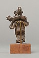 Bes carrying a ram over his shoulders, Cupreous metal