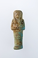 Worker Shabti of Henettawy (C), Daughter of Isetemkheb, Faience