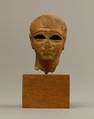 Head of a Female Figure from the Tomb of Khety, Wood, paint and paste fill