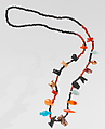 Necklace with disc beads and amulets, Carnelian, gold, silver, faience, glass, yellow stone, tin