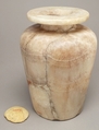 Inscribed shoulder jar with cartouche of Thutmose III, Crystalline travertine jar, limestone lid