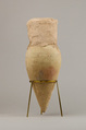Jar with pointed base and intact seal, Pottery